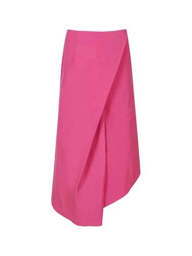 ASYMMETRIC WRAP MIDI SKIRT (PINK) - YCH - Modalova