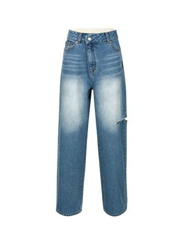 LOGO WAISTBAND CUTOUT JEANS (BLUE) - YCH - Modalova