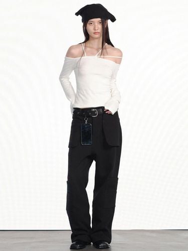 OUTSIDE PATCHED PANTS / BLACK - CERRIC - Modalova