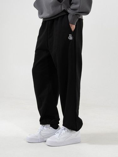 Symbol Logo Loose Fit Training Pants [Black] - POLYGRAM - Modalova