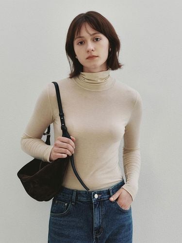 Essential Slim Wool Turtle Neck Top (Cream) - Neev - Modalova