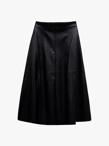 LEATHER FLARE LONG SKIRT_BLACK - healiote - Modalova