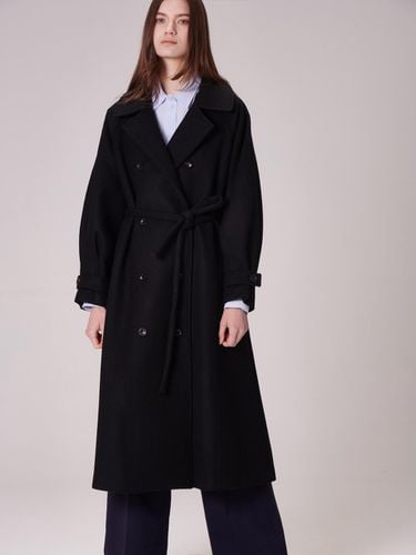 A flared long coat - THE AUTHOR: - Modalova