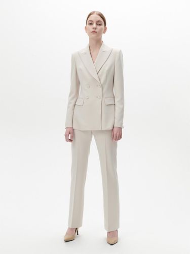 SIGNATURE FLARED PANTS [IVORY] - TOYKEAT - Modalova