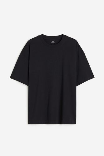 Baumwoll-T-Shirt in Oversize-Passform Schwarz Größe XS. Farbe: - H&M - Modalova
