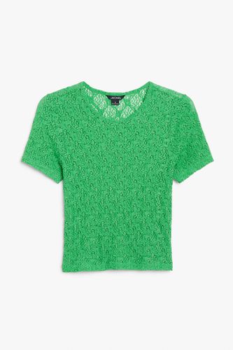 Grünes kurzärmeliges Spitzenoberteil Kellygrün, Tops in Größe L. Farbe: - Monki - Modalova