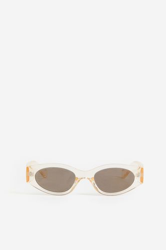 Ovale Sonnenbrille Transparent/Hellbeige, Sonnenbrillen in Größe Onesize. Farbe: - H&M - Modalova