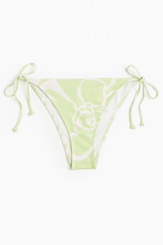 Tie-Tanga Bikinihose Limegrün/Geblümt, Bikini-Unterteil in Größe 34. Farbe: - H&M - Modalova