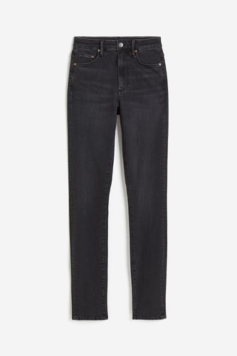 Shaping Skinny High Jeans Schwarz in Größe 34. Farbe: - H&M - Modalova