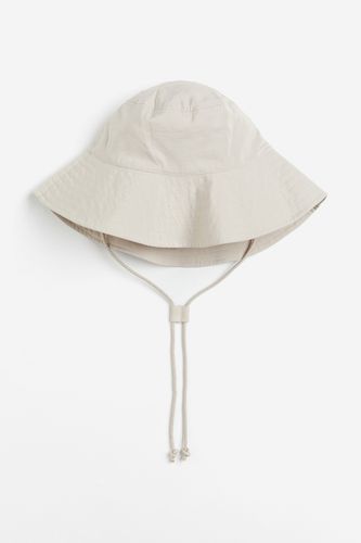 Bucket Hat mit Kinnbändern Hellbeige, Hut in Größe XS/S. Farbe: - H&M - Modalova