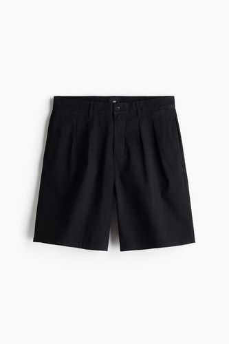 Chino-Shorts in Loose Fit Schwarz Größe W 33. Farbe: - H&M - Modalova