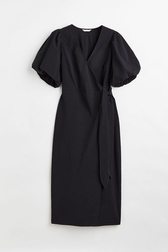 Wickelkleid mit Puffärmeln Schwarz, Alltagskleider in Größe XS. Farbe: - H&M - Modalova