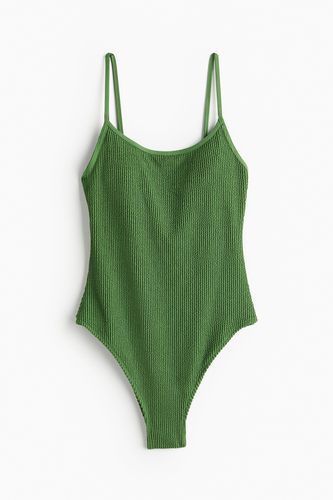 Badeanzug mit wattierten Cups und High Leg Grün, Badeanzüge in Größe 32. Farbe: - H&M - Modalova