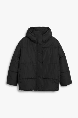 Wattierte Oversize-Jacke mit Kapuze Schwarz, Jacken in Größe M. Farbe: - Monki - Modalova
