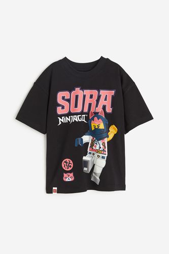 T-Shirt mit Print Schwarz/LEGO NINJAGO, T-Shirts & Tops in Größe 92. Farbe: - H&M - Modalova