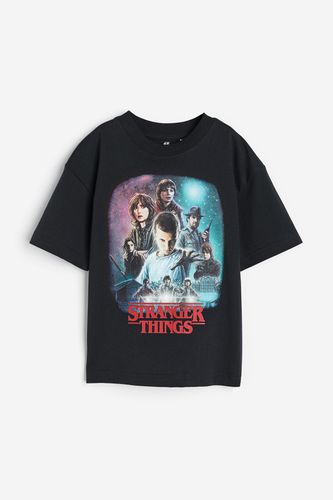 T-Shirt mit Print Schwarz/Stranger Things, T-Shirts & Tops in Größe 122/128. Farbe: - H&M - Modalova