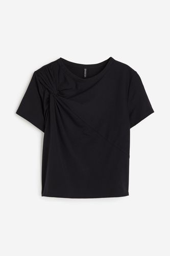 T-Shirt mit Twistdetail Schwarz in Größe XXS. Farbe: - H&M - Modalova