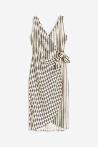 Wickelkleid mit V-Ausschnitt Hellbeige/Gestreift, Alltagskleider in Größe XS. Farbe: - H&M - Modalova