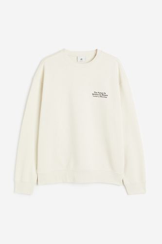 Bedrucktes Sweatshirt in Loose Fit Cremefarben/Stones, Sweatshirts Größe L. Farbe: - H&M - Modalova