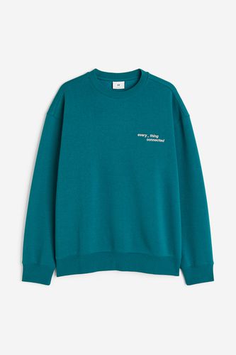 Bedrucktes Sweatshirt in Loose Fit Blaugrün/Connected, Sweatshirts Größe XS. Farbe: - H&M - Modalova