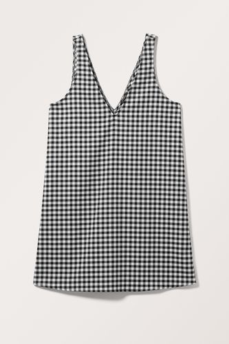 Kurzes A-Linien-Kleid mit V-Ausschnitt Schwarz-Weiß-Karo, Alltagskleider in Größe XS. Farbe: - Monki - Modalova