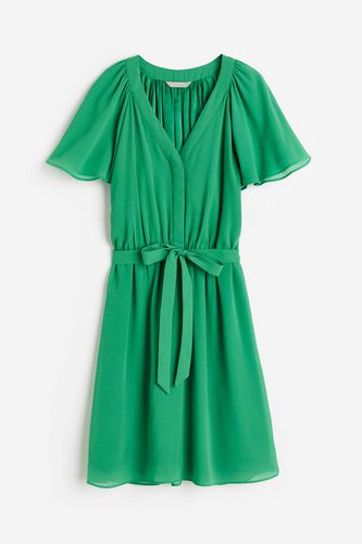Chiffonkleid mit V-Ausschnitt Grün, Alltagskleider in Größe L. Farbe: - H&M - Modalova