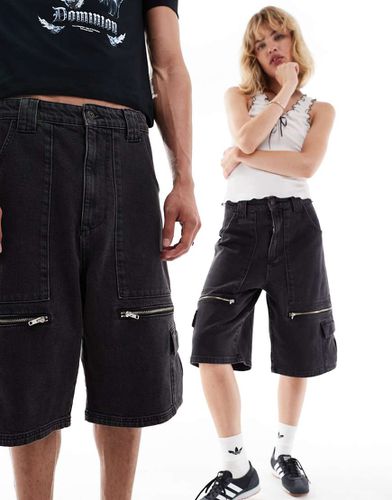 Iconic - Jorts stile skater da festival unisex nero slavato con tasche e fibbie - Collusion - Modalova