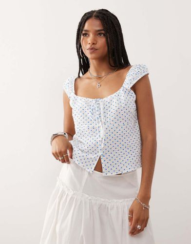 Top babydoll noué devant - Bleu à pois - Collusion - Modalova