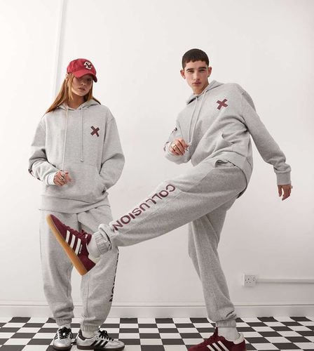 Unisex - Joggers mélange con logo e stampa bordeaux - Collusion - Modalova