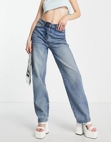 X014 - Dad jeans ampi in stile anni '90 a vita medio alta lavaggio stone wash - Collusion - Modalova