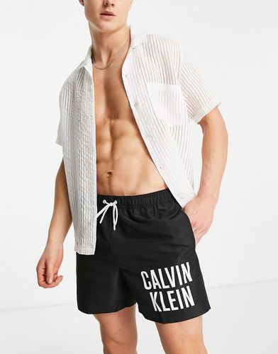 Core - Pantaloncini da bagno neri con logo sulla coscia - Calvin Klein - Modalova