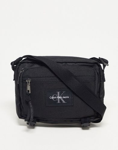 Essentials - Camera bag a tracolla nera - Calvin Klein Jeans - Modalova