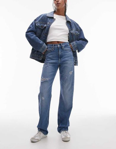 Jeans dritti a vita alta lavaggio chiaro con strappi - Calvin Klein Jeans - Modalova