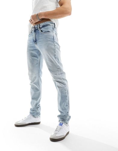 Jeans slim affusolati lavaggio chiaro - Calvin Klein Jeans - Modalova