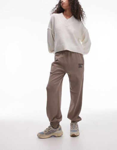 Pantalon de jogging en tissu éponge - Gris taupe délavé - Calvin Klein Jeans - Modalova