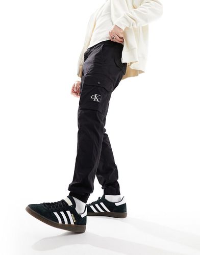Pantaloni cargo skinny slavati neri - Calvin Klein Jeans - Modalova