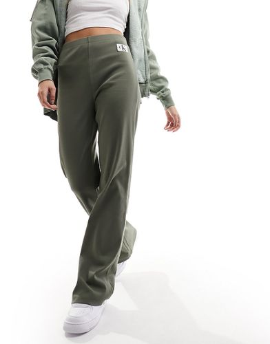 Pantaloni dritti oliva con logo - Calvin Klein Jeans - Modalova