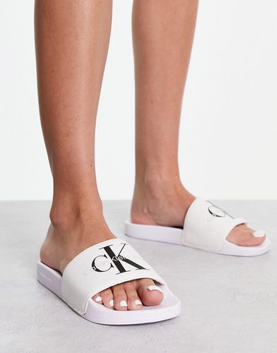 Sliders bianche con logo a monogramma - Calvin Klein Jeans - Modalova