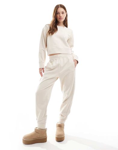 Joggers da casa color crema con fascia in vita con logo tono su tono - Calvin Klein - Modalova