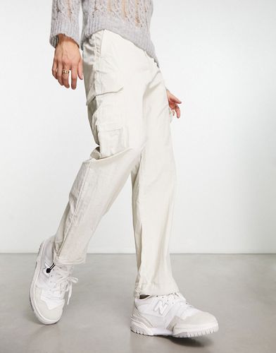 Pantaloni cargo stropicciati a fondo ampio beige - Calvin Klein - Modalova