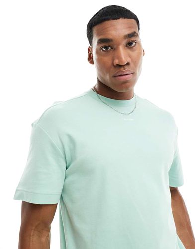 T-shirt menta con logo centrale - Calvin Klein - Modalova