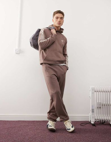 Trefoil Essentials - Joggers marroni - adidas Originals - Modalova