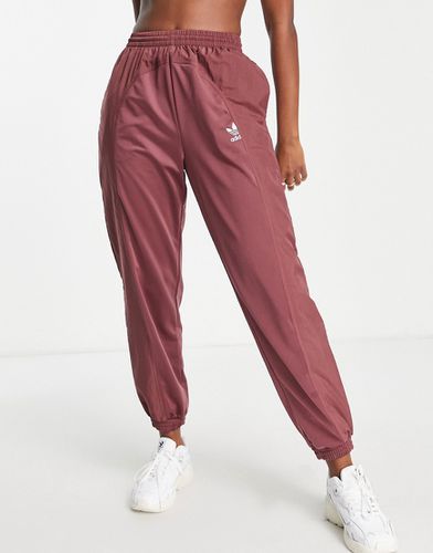 Adicolor Bold - Pantaloni sportivi color cremisi tenue - adidas Originals - Modalova