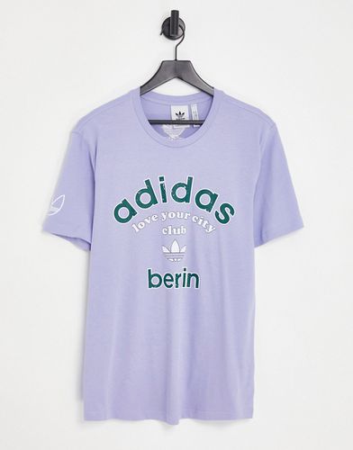 Berlin - T-shirt lilla con logo - adidas Originals - Modalova