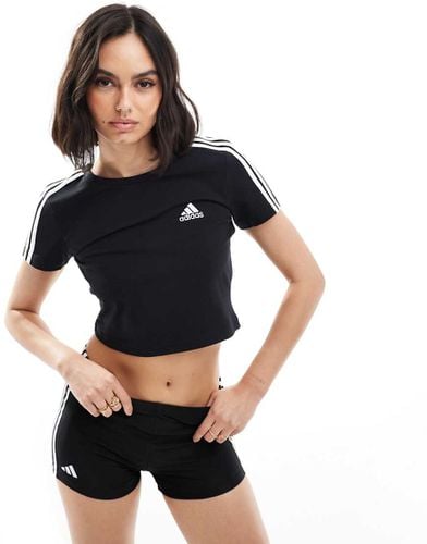 Essentials - T-shirt nera con 3 strisce - adidas performance - Modalova