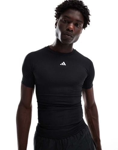 Adidas - Training Techfit - T-shirt nera a compressione - adidas performance - Modalova