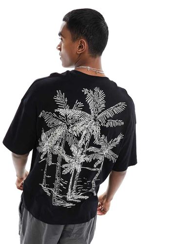 T-shirt oversize nera con stampa di palme sul retro - ADPT - Modalova