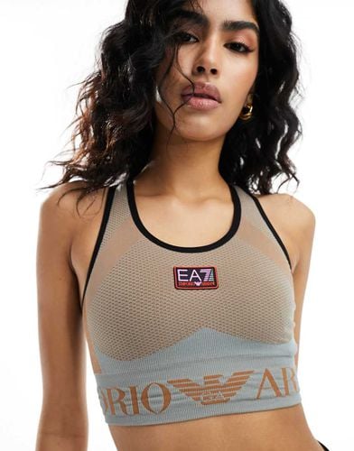 Armani - Top reggiseno sportivo chiaro con logo al centro e sul bordo in coordinato - EA7 - Modalova