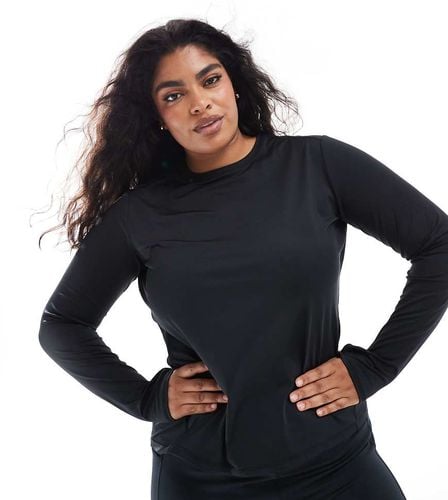 Curve - Icon - Top da corsa a maniche lunghe - ASOS - Modalova