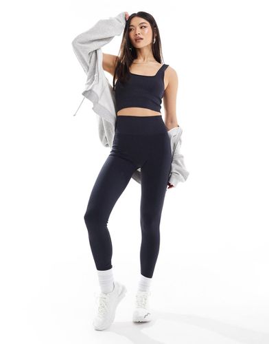 Icon - Leggings da palestra blu navy a coste senza cuciture - ASOS - Modalova